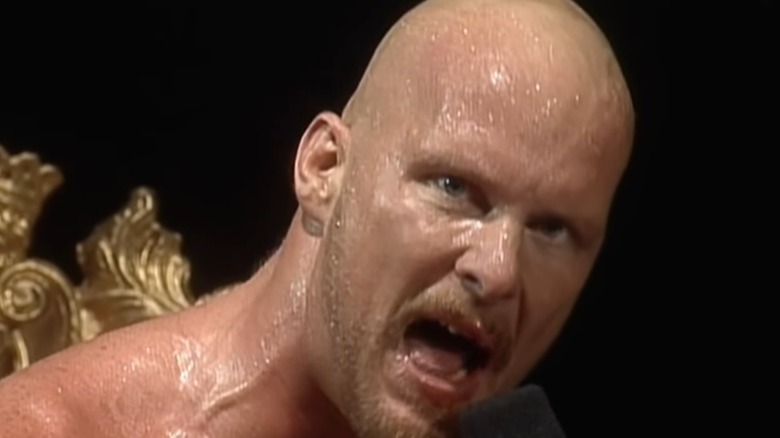 Steve Austin cutting a promo on the mic