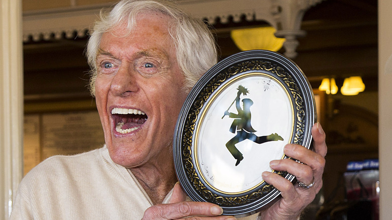 Dick Van Dyke holds up plate