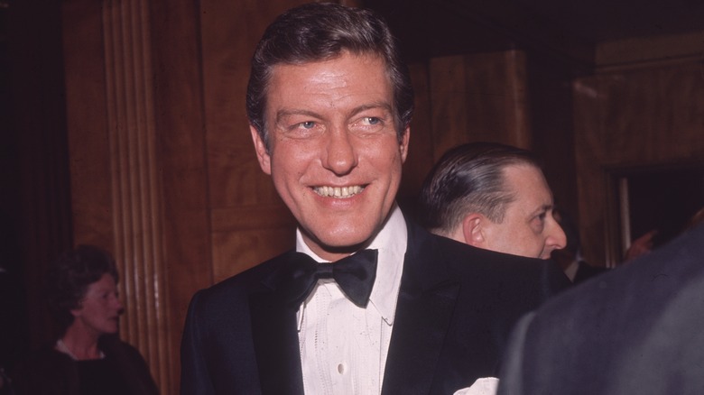 Dick Van Dyke walking and smiling