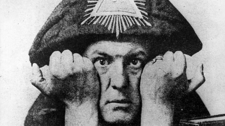 Aleister Crowley posing 