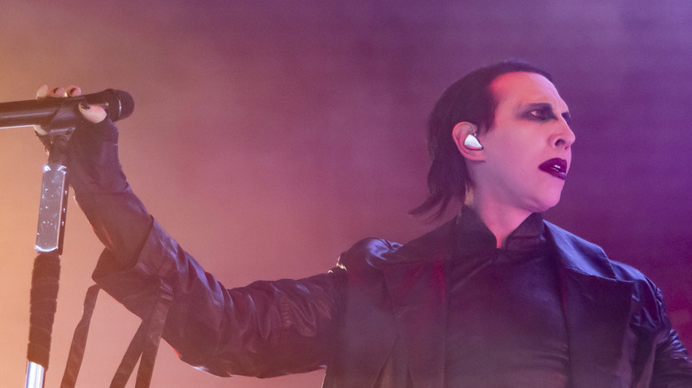 Marilyn Manson onstage with microphone