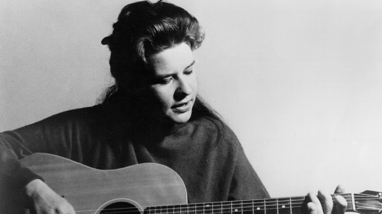 Janis Joplin with acoustic guitar