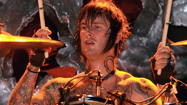 The Rev playing the drums