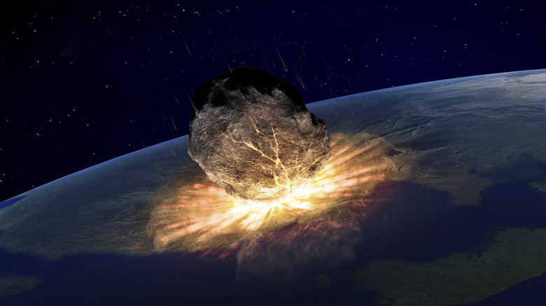 Artwork of asteroid hitting earth