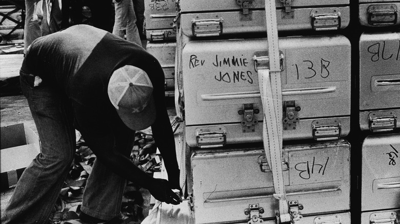 Jonestown coffins are strapped in place