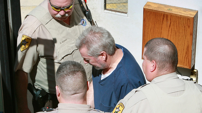 Drew Peterson in handcuffs