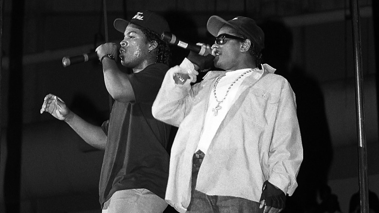 Eazy-E performs with Ice Cube