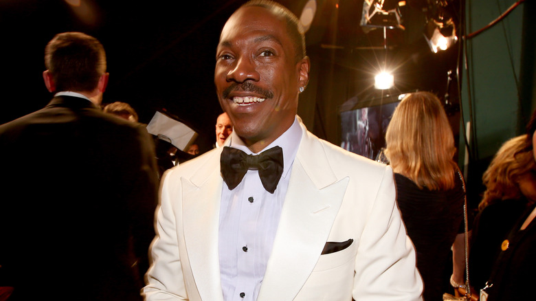 Eddie Murphy smiling at event