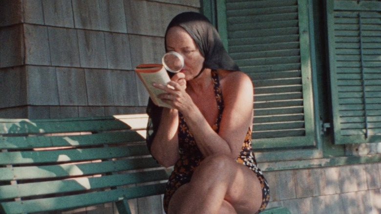 Edith Bouvier Beale reading through magnifying glass