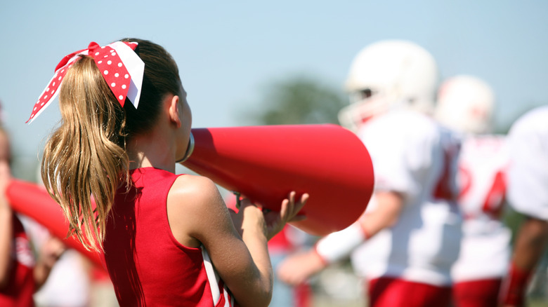 cheerleader with red megaphone 