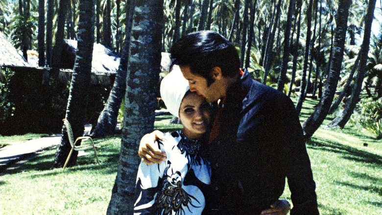 elvis and priscilla presley hugging