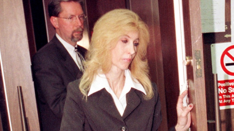 debbie nelson angrily leaves courtroom with lawyer in 2001