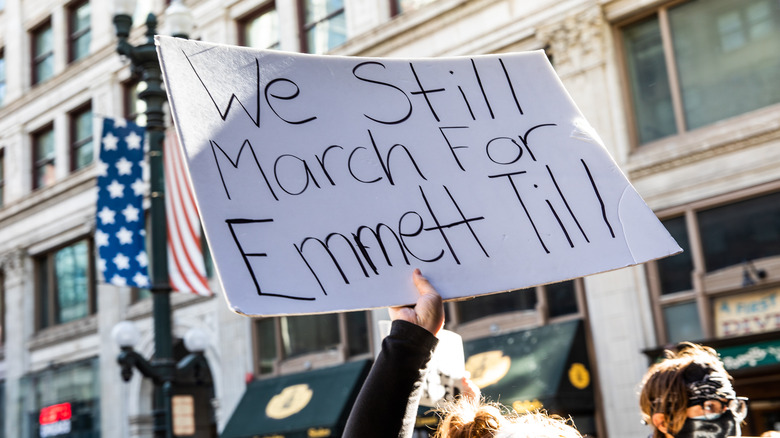 Emmett Till sign demonstrator