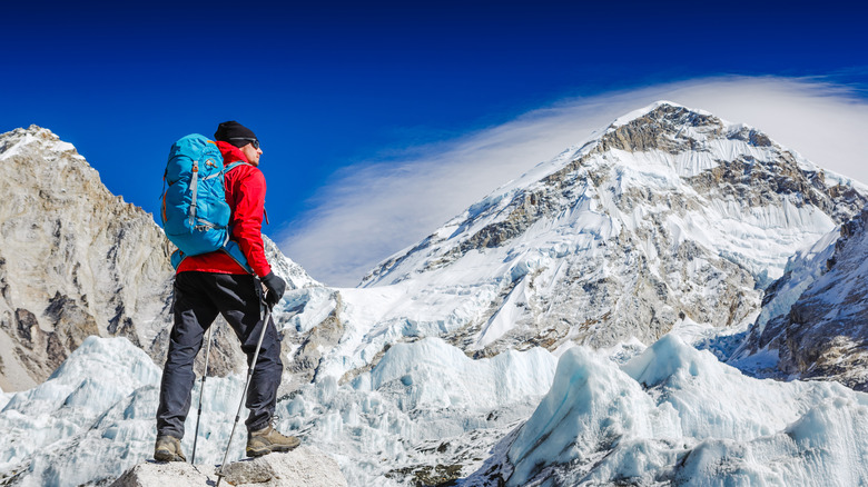 Climber on mountainous terrain