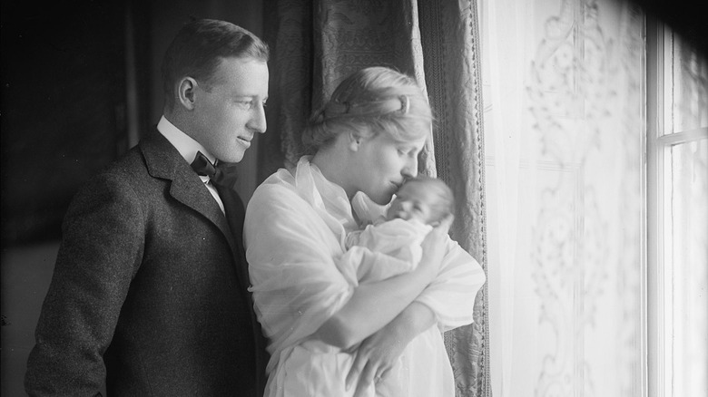 Infant Francis Bowes Sayre Jr. with his mother and father