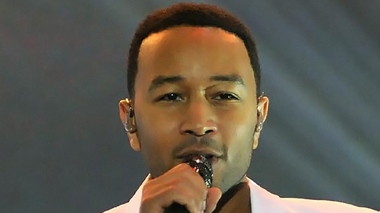 John Legend on stage performing