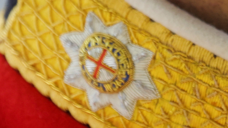 The Order of the Garter Star white on yello