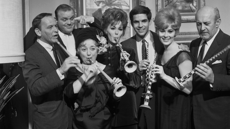 The cast of "Come Blow Your Horn" posing for a photo