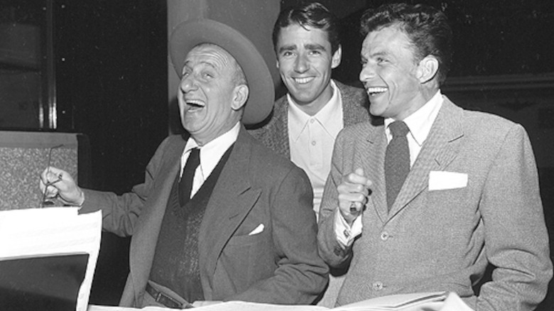 Leo Durante, Peter Lawford, and Frank Sinatra on the set of "It Happened in Brooklyn"