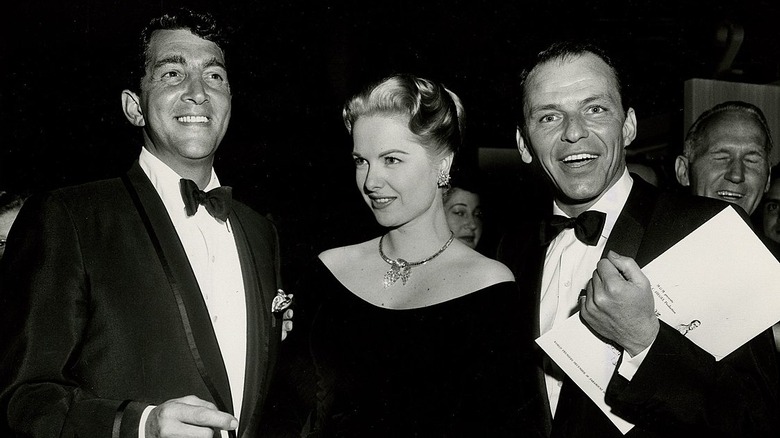 Dean Martin, Martha Hyer, and Frank Sinatra at the world premiere of "Some Came Running"