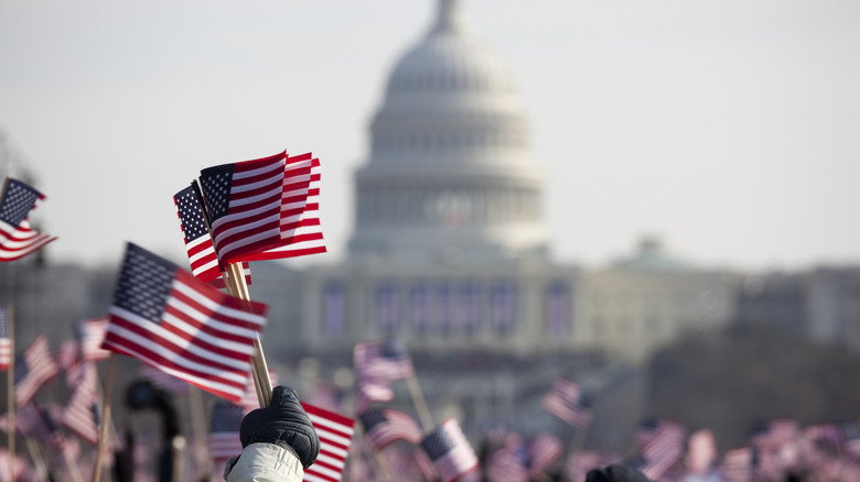 American flags waving near capitol building