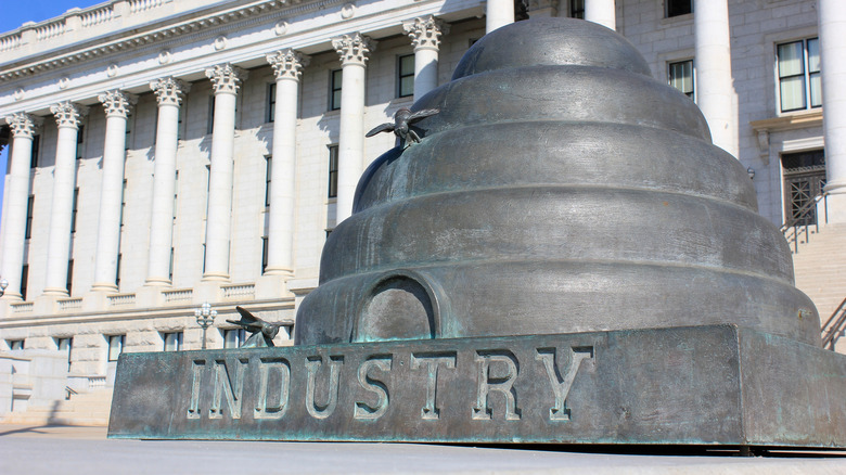 Beehive monument that reads industry