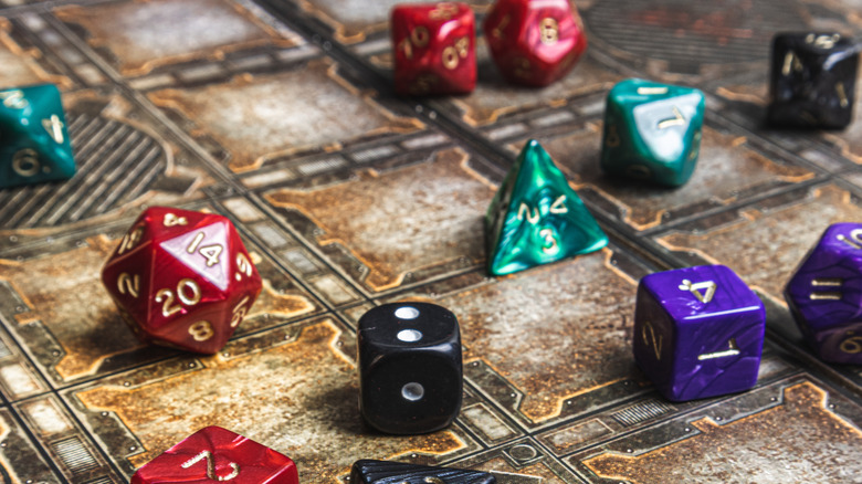 Set of role playing dice on a gaming mat.