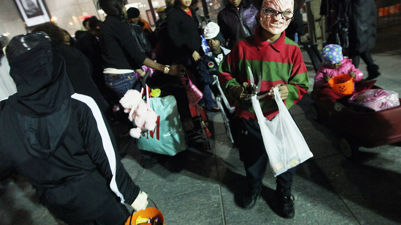 Halloween celebration in with trick-or-treaters in New York City