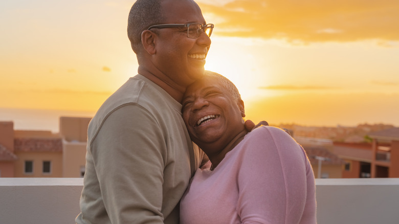 Happy couple at sunset