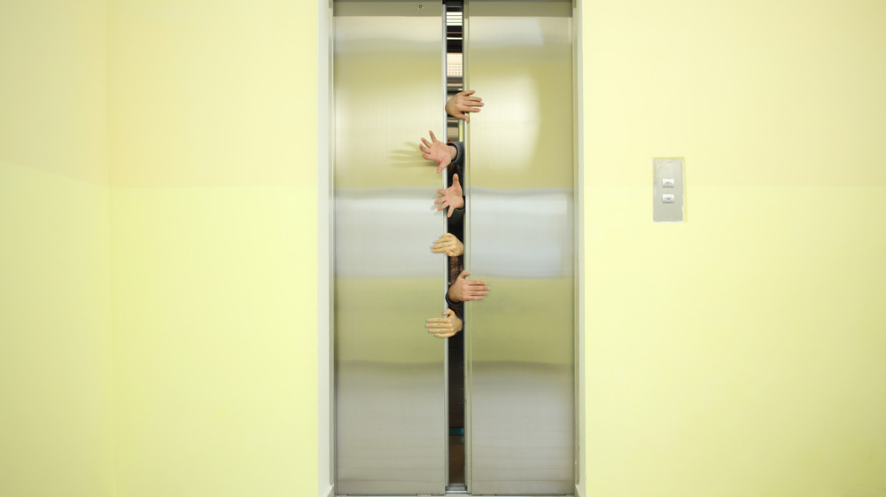 People trying to escape an elevator