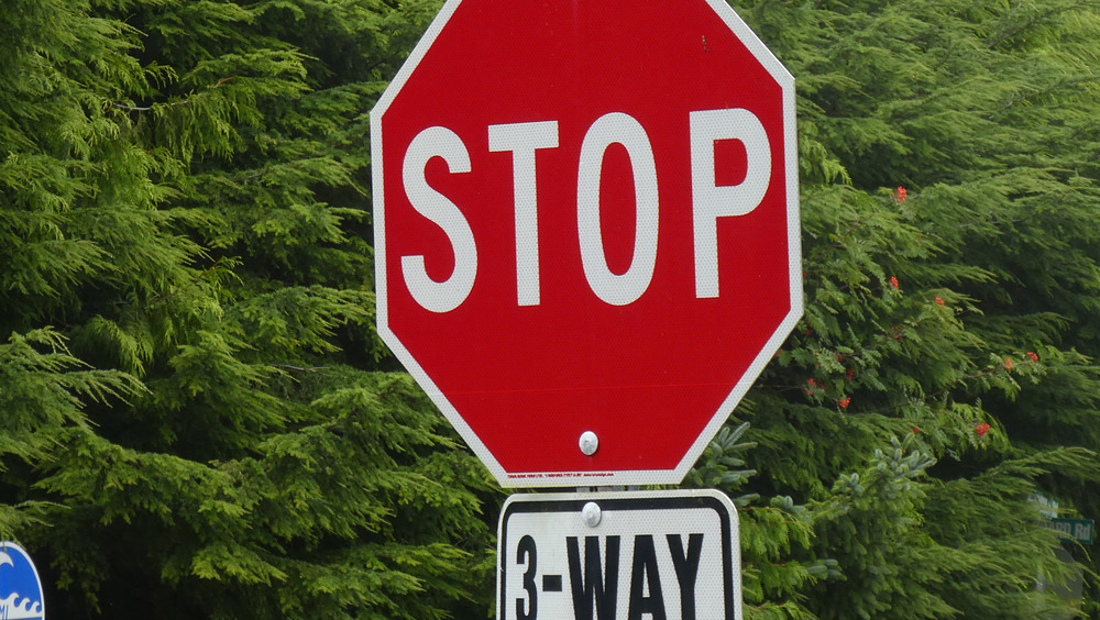 Three-way stop sign