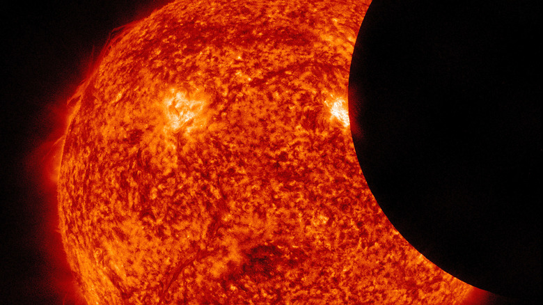 Lunar transit across the sun