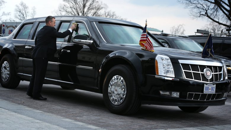 Secret Service agent cleaning windows