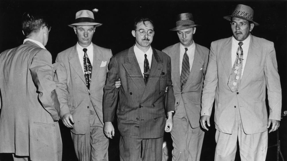 FBI agents escorting a suspect