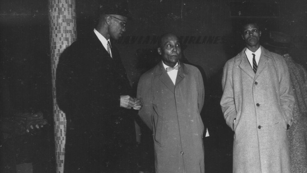 Malcolm X, Elijah Muhammad, and Louis Farrakhan