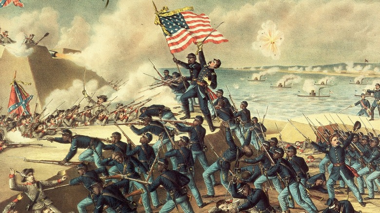 Union army raising flag during battle