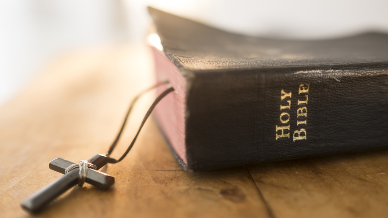 Closed bible with cross