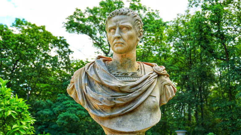 A bust of Caligula in a park