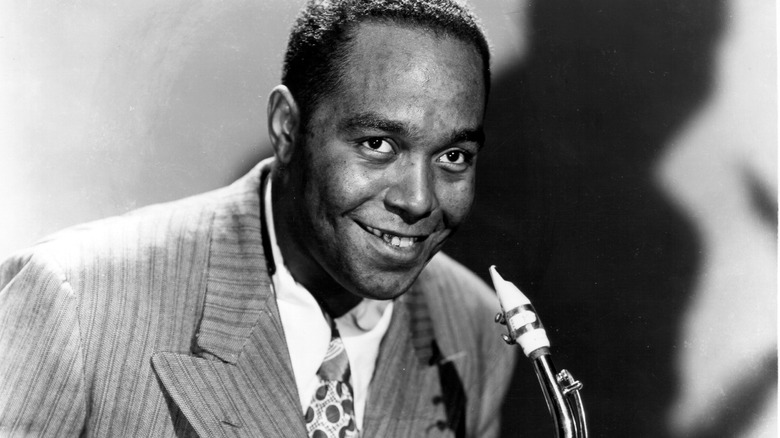 Charlie Parker holding his saxaphone