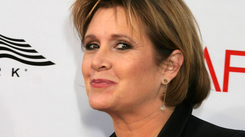 Carrie Fisher at a media event in 2004