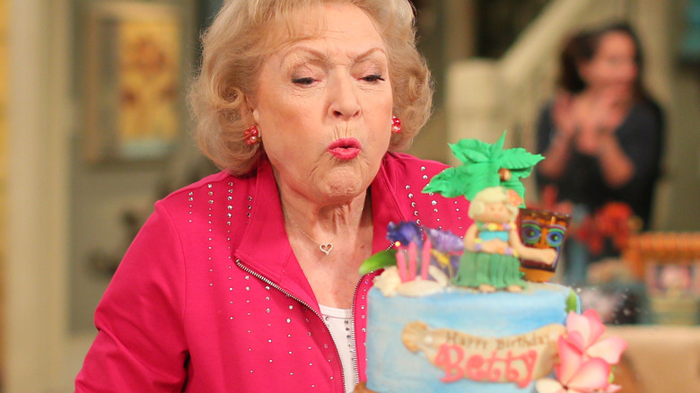 Betty White celebrating a birthday on set