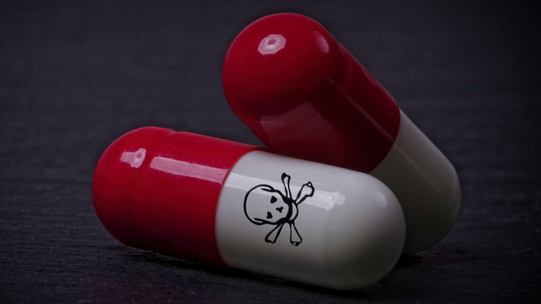 Pills with skull and crossbones