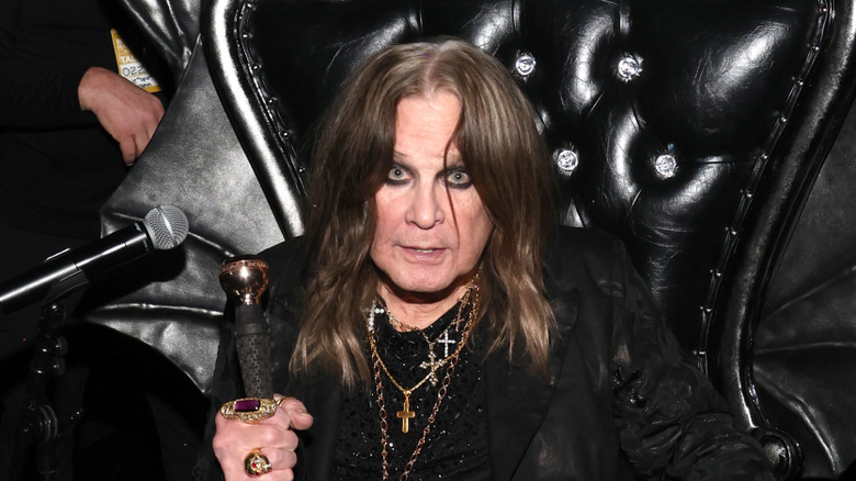 ozzy osbourne staring out from throne during rock and roll hall of fame induction