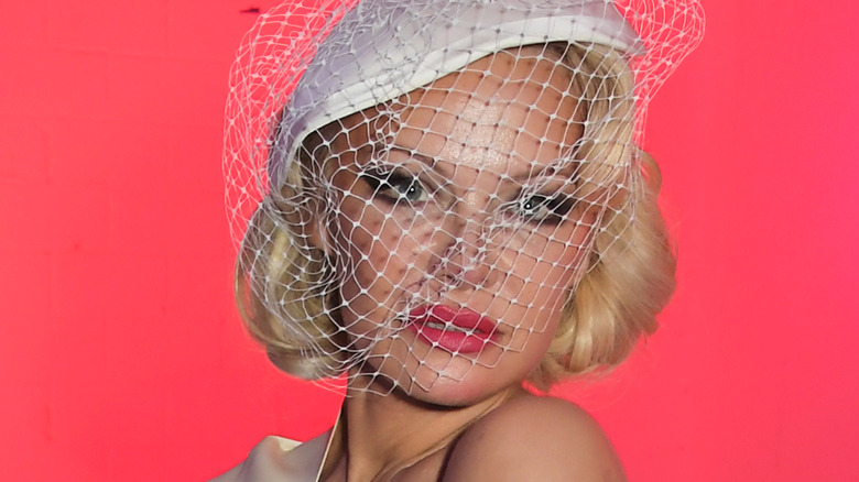 Pamela Anderson wearing a veil