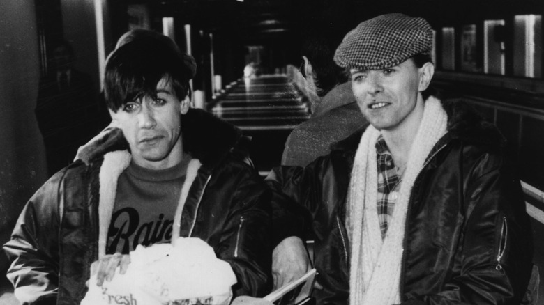 Iggy Pop and David Bowie riding subway