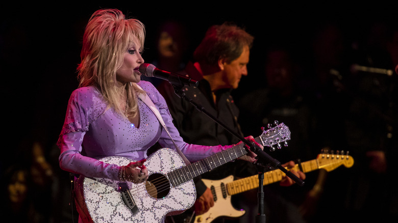 Dolly Parton with guitar