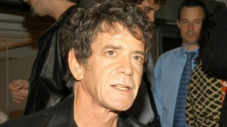 lou reed early 2000s gritting teeth leather jacket