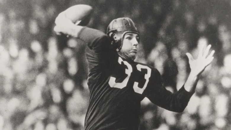 Sammy Baugh throwing a pass