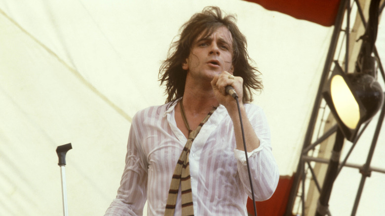 Eddie Money long hair performing onstage