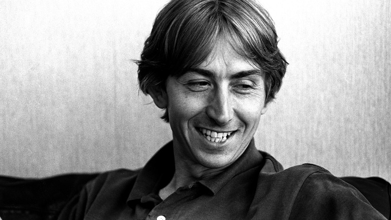 Mark Hollis laughing and looking down